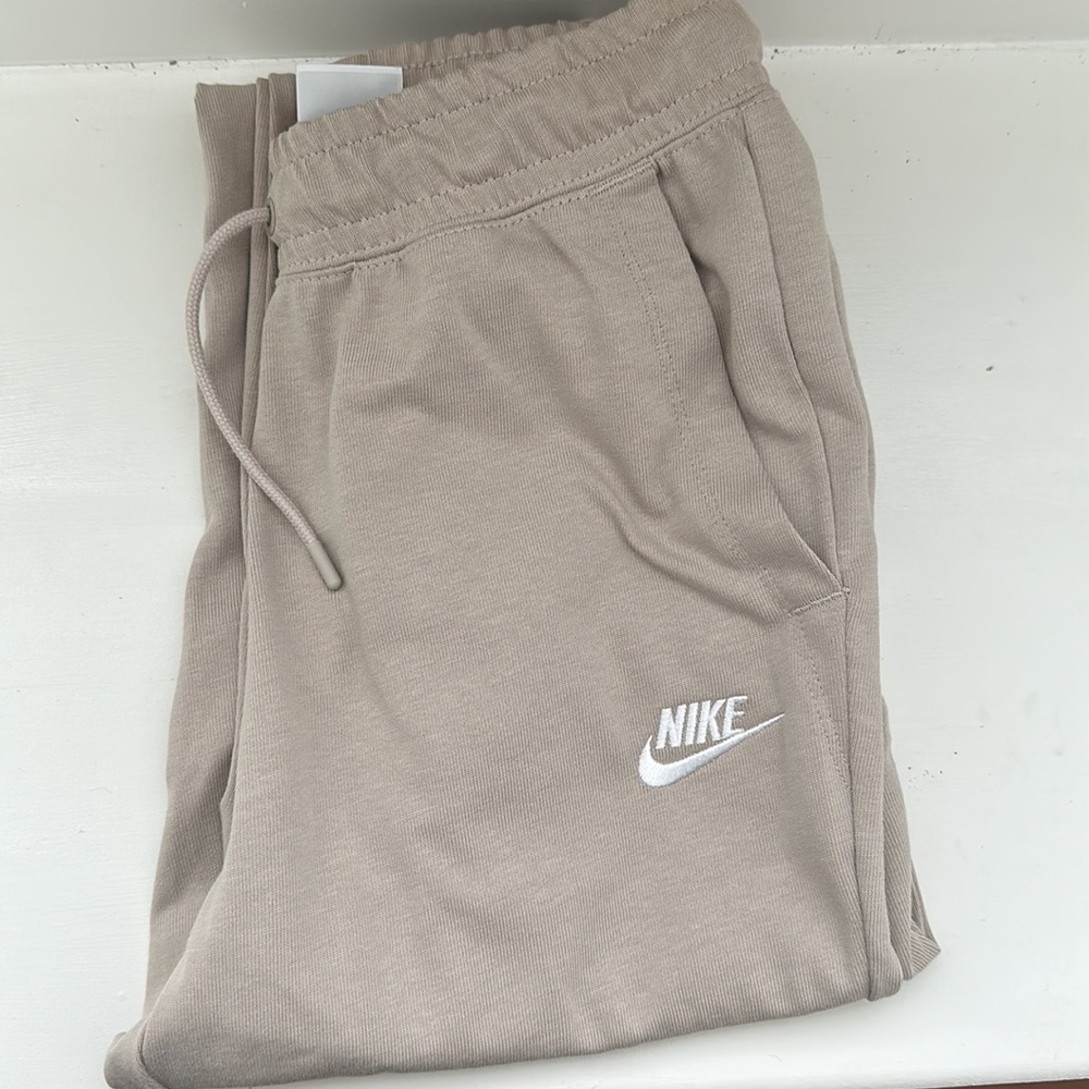 Beige Nike joggers